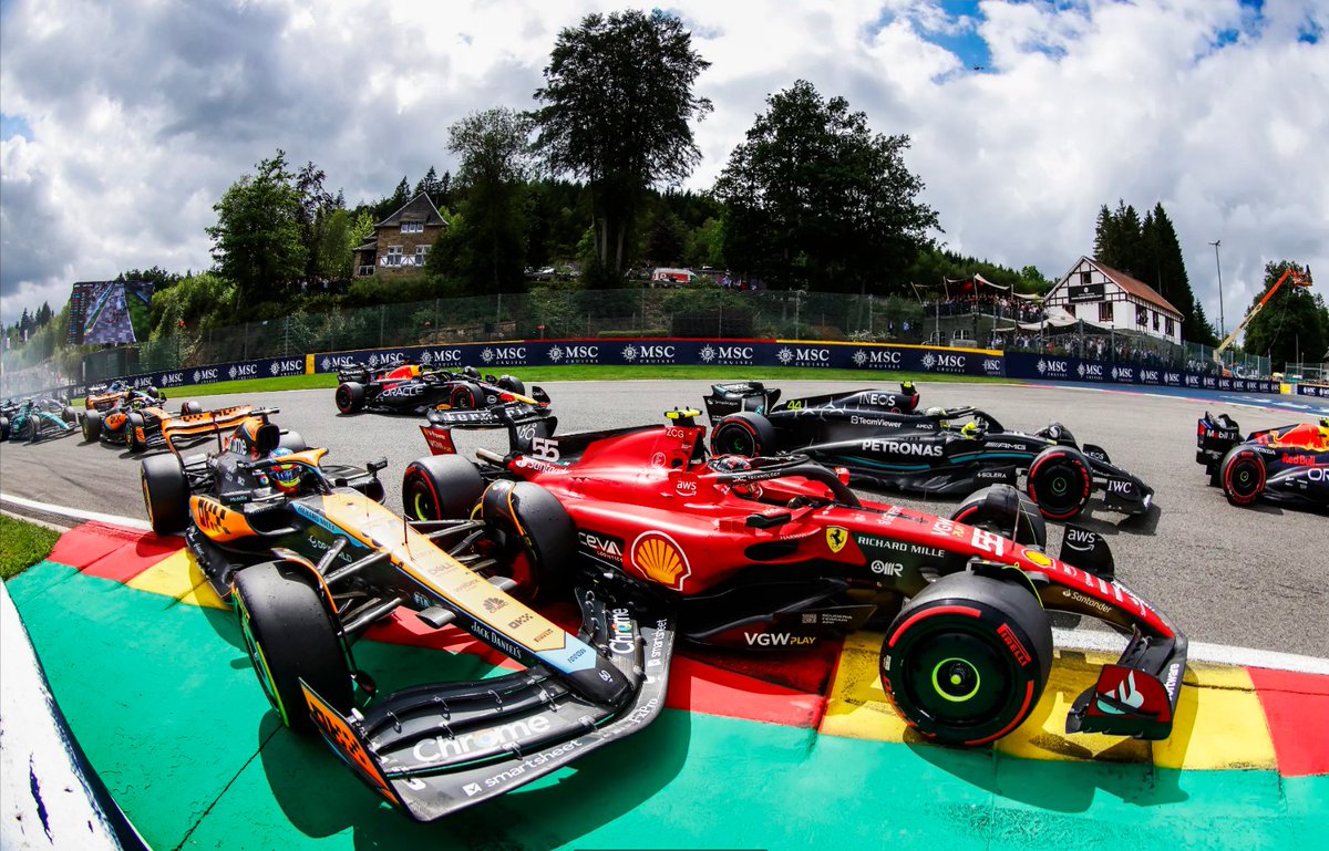there_is_no_if's tweet photo. Photo by Steven Tee of the moment Piastri and Sainz made the contact at T1 during the start of #BegianGP. What a shot! #F1 https://t.co/FOkPYgAXxN