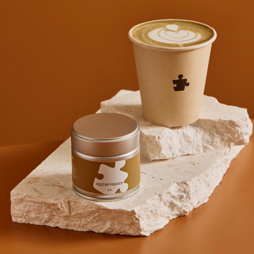 thepuzzlecoffee's tweet photo. 😉Get cozy with our Hojicha Latte, the perfect drink to warm you up! With its nutty caramel roasted flavour, it's sure to become your favourite go-to. 

Plus, if you can't get enough of it, grab our premium-grade Hojicha Powder from our retail section in-store. https://t.co/x7JMdUwH1C