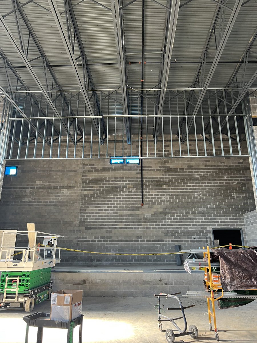 SuperJZip's tweet photo. RBES new addition is getting closer!  When your husband is the Electrician foreman on the job you get a behind the scenes tour🤗 I can’t wait to see all of our students in here soon! https://t.co/oFBXXa49zg