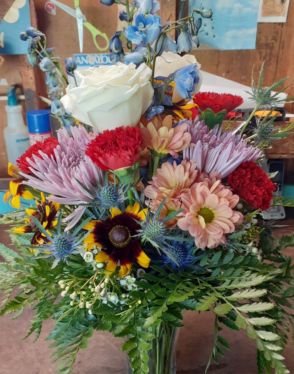 My latest arrangement 🥰 #handmade #flowers #florist #floraldesign #floralart #wildflowers #thistle #roses #carnations #blackeyedsusan #delphinium #chrysanthemums #waxflower #ferns #nature