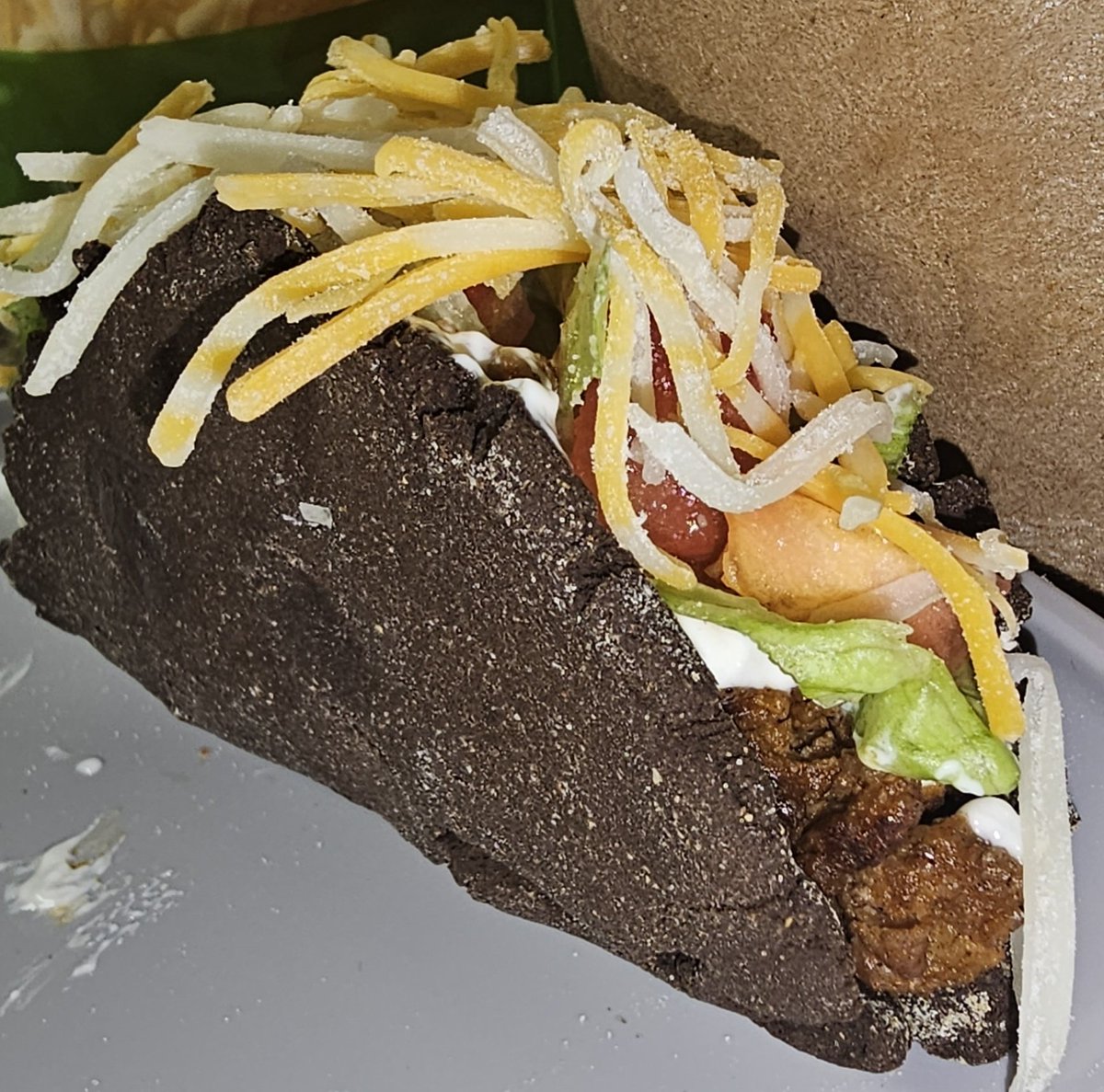LazloPgc's tweet photo. You all thought it was just a meme. Well, thanks to @MokonaSenpai_VT making the shell and my desire to try weird food... Now it's a reality!

@tacobell, I'm waiting for this to be added to the menu for sure!
#Vtuber #ENVtuber #VtuberBaking #WeirdFood #ThisWasAMeme https://t.co/9sEdQnXnyN