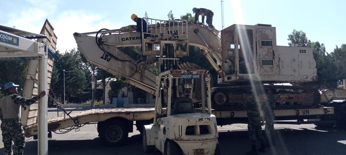 UNDOF's tweet photo. The workshop technicians of INDCON LOGCOY addressing day to day repair, maintenance and recovery activities. Their technical knowledge combined with ability to adapt to addressing various challenges of vehicles/equipments has always kept @UNDOF  on the move. 🇮🇳🇺🇳🕊️ https://t.co/kZPwIBWiDZ
