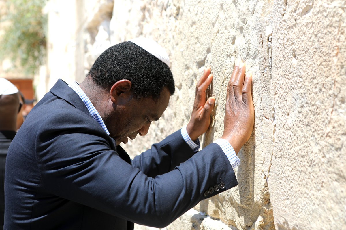 HHichilema's tweet photo. Today in the Old City of #Jerusalem, we visited the Western Wall, also known as Wailing Wall. At this sacred site, we prayed for peace &amp; unity for all &amp; placed our prayer petitions in the Wall’s stones. A deeply spiritual experience that’s energised our faith.🇿🇲🇮🇱 https://t.co/YIedH4lhEN