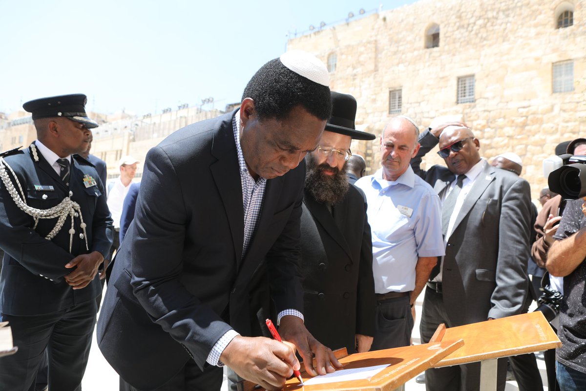 HHichilema's tweet photo. Today in the Old City of #Jerusalem, we visited the Western Wall, also known as Wailing Wall. At this sacred site, we prayed for peace &amp; unity for all &amp; placed our prayer petitions in the Wall’s stones. A deeply spiritual experience that’s energised our faith.🇿🇲🇮🇱 https://t.co/YIedH4lhEN