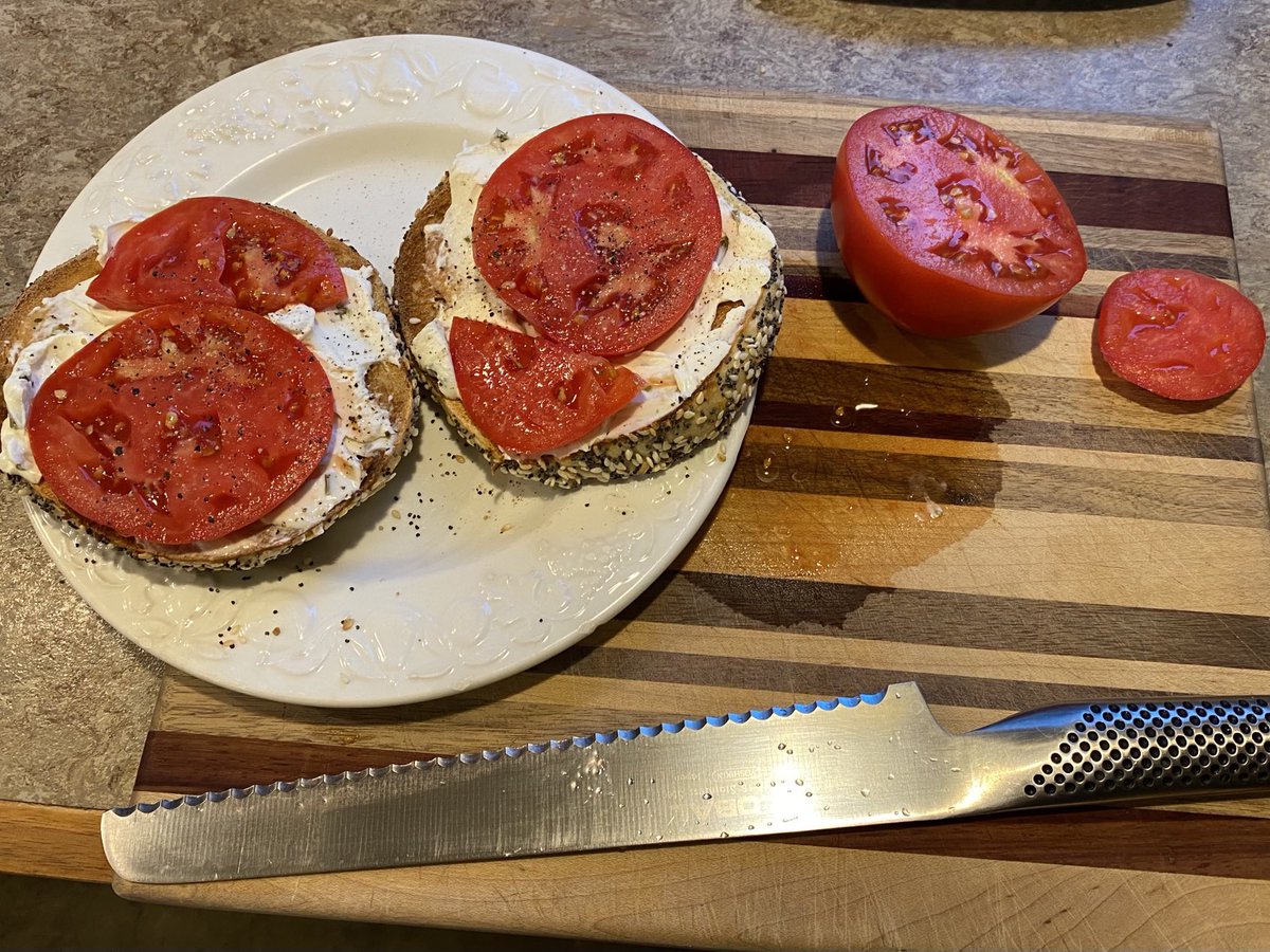 I’ve been waiting 9+ months for this: first slicing tomato from the garden w bagel and cream cheese.