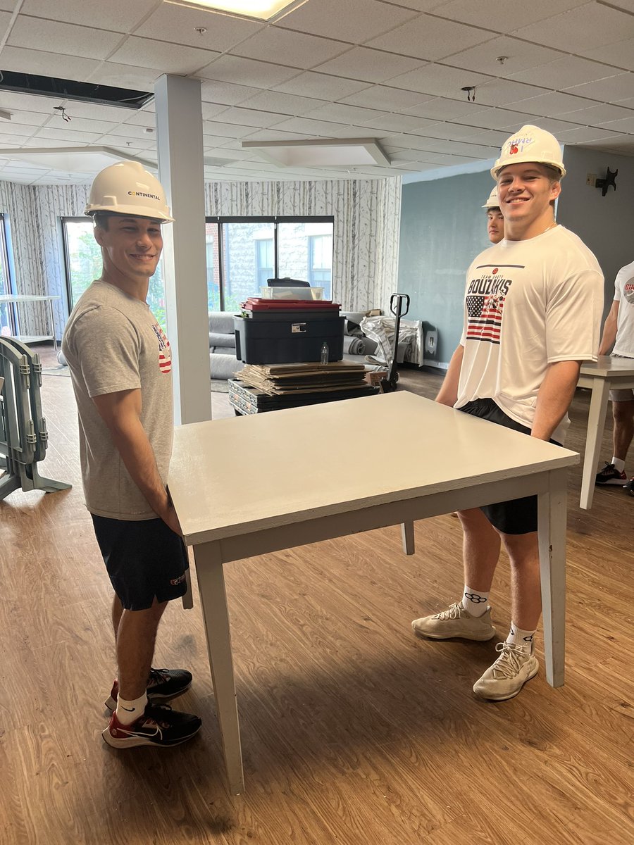 wrestlingbucks's tweet photo. Members of the Wrestling and Men’s Lacrosse teams helped out with construction of the new Ronald McDonald House in downtown Columbus Monday. #GoBucks https://t.co/CJaOKT2sMa