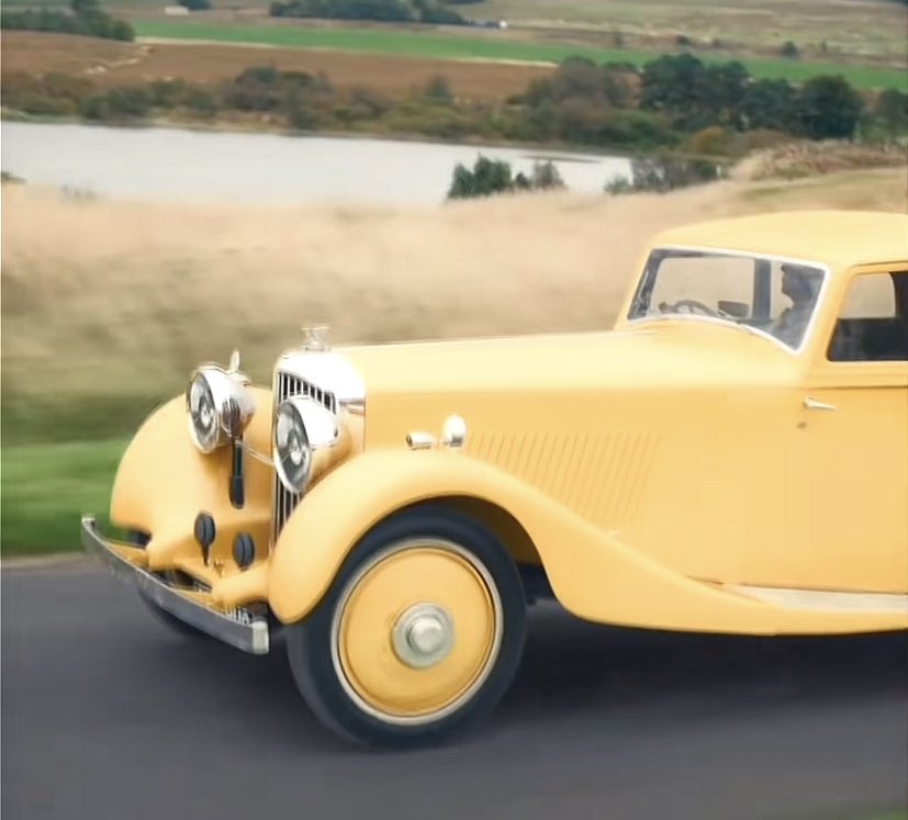 tinytenth's tweet photo. i can’t even begin to comprehend that we got the nastiest and most painful kiss ever played and the fucking yellow bentley in the same season. #GoodOmens2Spoiler https://t.co/xfYGYxH2kr