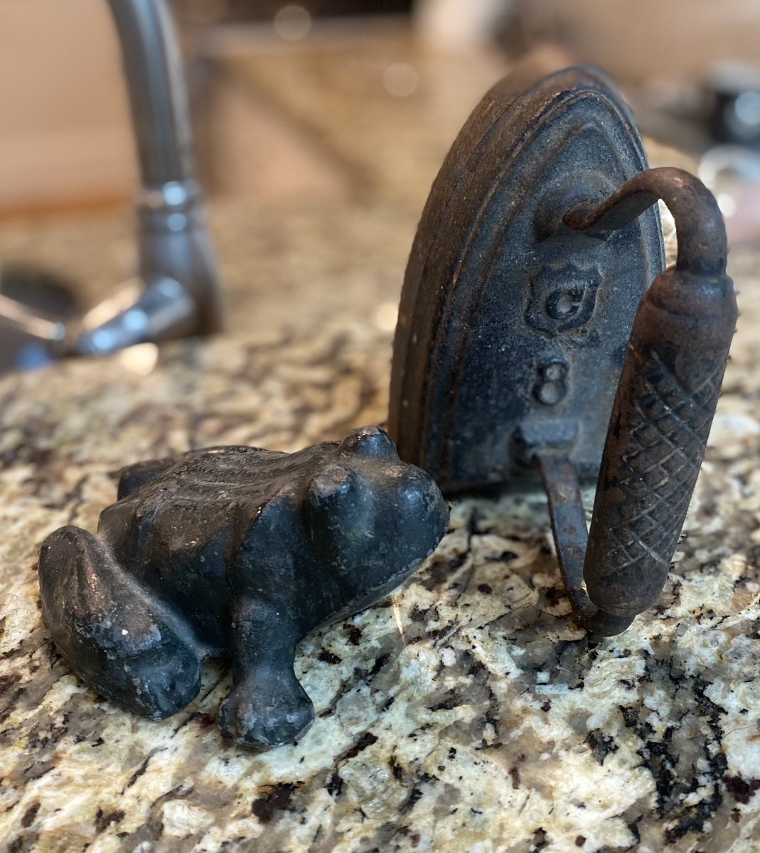 Knocked down a wall in my basement and behind it was a window that leads to nowhere now. These were on the windowsill! Cast iron, about 10 pounds each. My house is about 80 years old… anyone have a clue how old these could be?? Love me a hidden treasure!