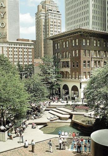 e_urbanism's tweet photo. @StrongTowns Main Street in Tulsa went the opposite direction. It was once a beautiful pedestrian mall, now it's just a street with a roundabout. https://t.co/GIzbSD2QZ4