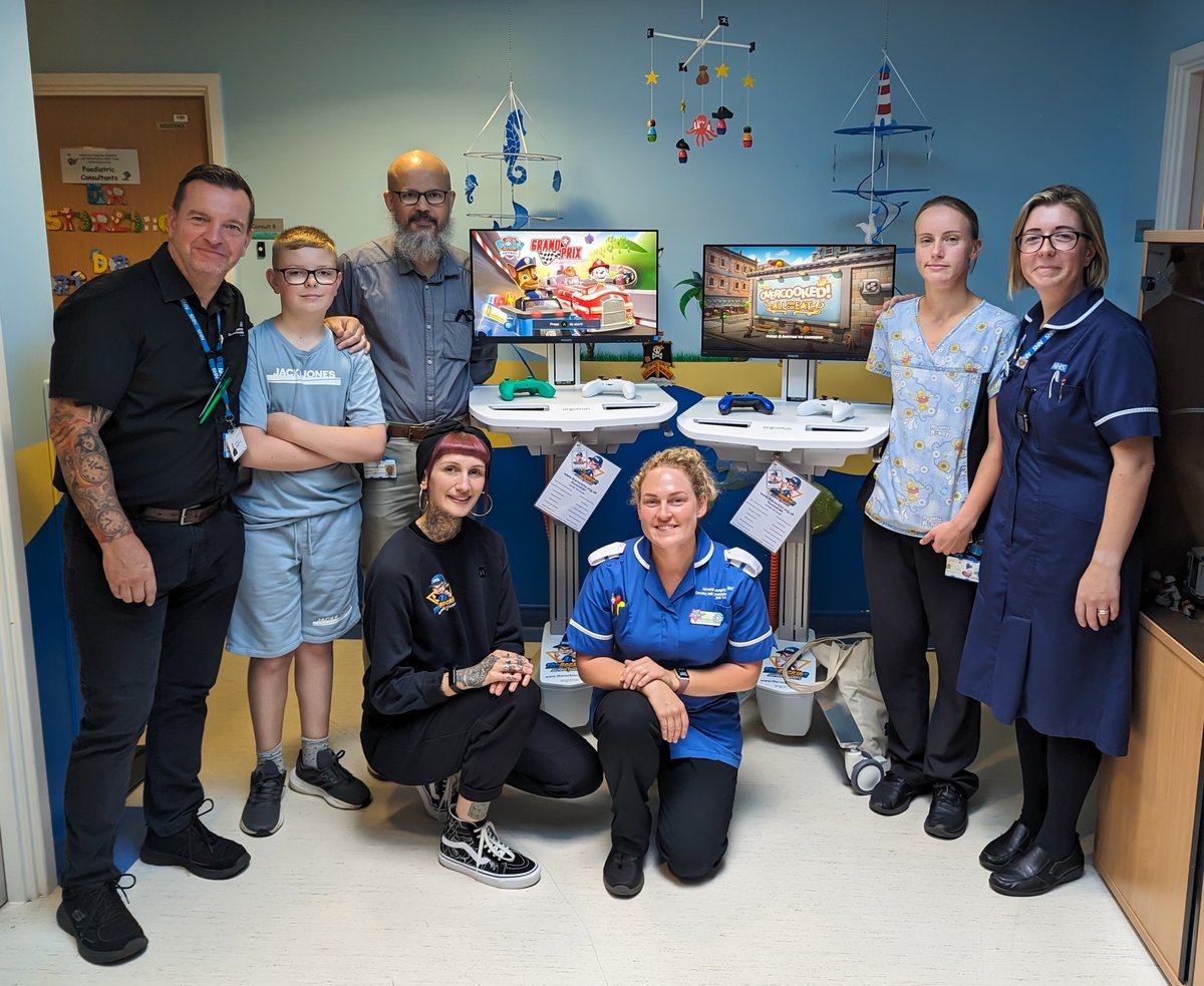 TheRockinR's tweet photo. What an honour to visit @NHSUHCW to meet The Cowen Family. @Raising_RHYS is a not-for-profit organisation in memory of a young man called Rhys, who sadly passed away from Rhabdomyosarcoma (Cancer) in 2020 at 13 years old.

David (Dad), Charlene (Mum) & Aaron (Little Bro) funded two @Xbox Series S Gaming Carts for Ward 16—a gift on behalf of Rhys, who often wished to help other Children going through similar experiences 🎮

It's inexplicable to meet other families who have endured similar tragedies, yet they march on and do everything they can to help others and create a long-lasting legacy. Despite the heartache we all experience daily, we continue to do our best 🤝

Massive respect for The Cowens. It was the greatest pleasure to meet you all, and we're so glad you love the Gaming Carts. Rhys would be very proud.

Happy Gaming Coventry 💙

Ft. @PAWPatrol Grand Prix from @Outright_Games & @OvercookedGame All You Can Eat from @Team17 🎮

#Reece #TheRockinR #RHYS #Forever13 #ourboys #inspirational #medicalgamingcarts #medical #gaming #technology #xbox #xboxseriess @xboxuk #wellbeing #wellness #distraction #children #paediatric #universityhospitalcoventryandwarwickshire #coventry #hospital #NHS #healthcare