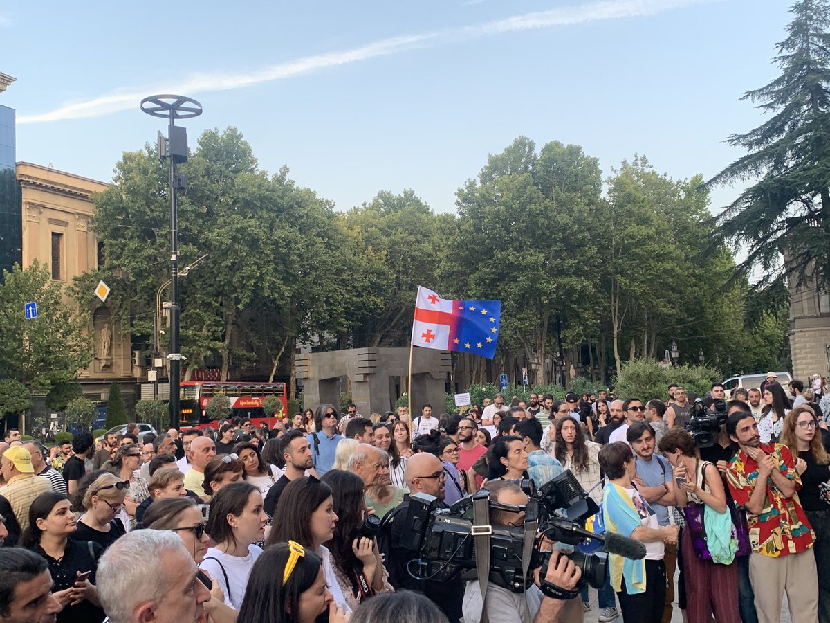 Kalmariii's tweet photo. People gathering  in front of the #Georgian parliament building to protest Russian cruise ship arriving from Sochi in Batumi. https://t.co/X9P7KGLJYQ