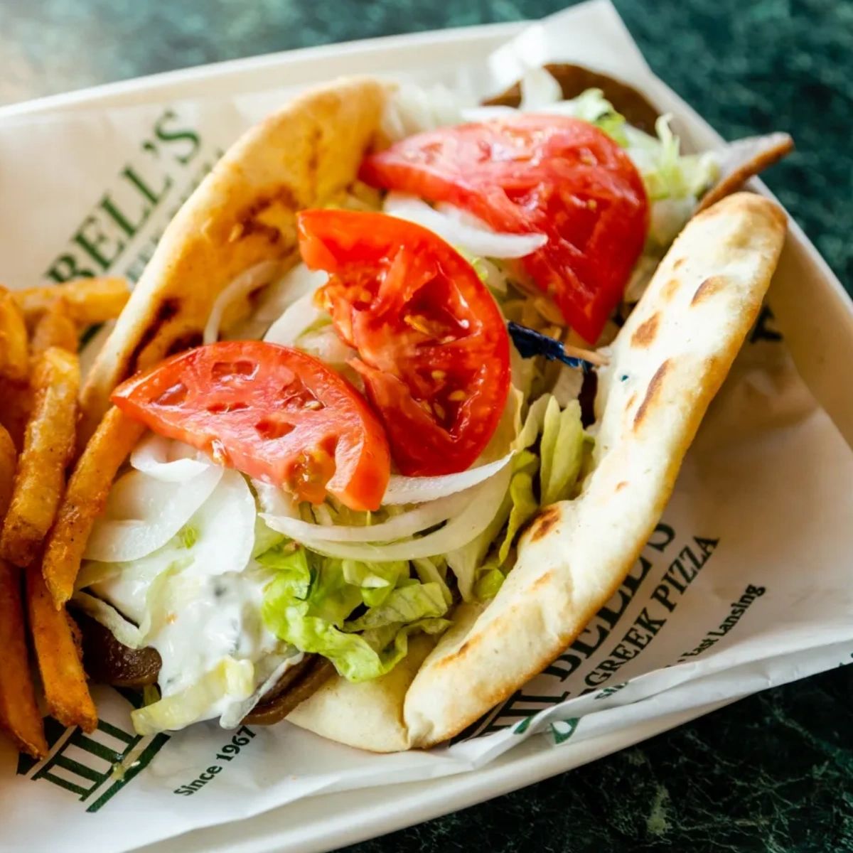 Bell's Greek Pizza tweet media