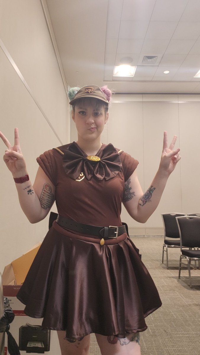 GimmieMooreCos's tweet photo. I forgot to get professional photos but here it is my @UPS sailor scout! What started as a fever dream meme because probably one of my most popular cosplays at con. I plan on updating it and adding more! I used my work clothes like my visor, diad holder, and belt! https://t.co/12Y33oLxkE