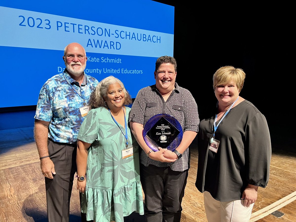 EducationMN's tweet photo. Dakota County United Educators President Kate Schmidt wins our union's highest honor -- the Peterson-Schaubach Award. In one of the state's largest districts, her relationships w/members and admin are invaluable and give everyone a voice and a seat at the table. #sumsem https://t.co/GYcnsh871W