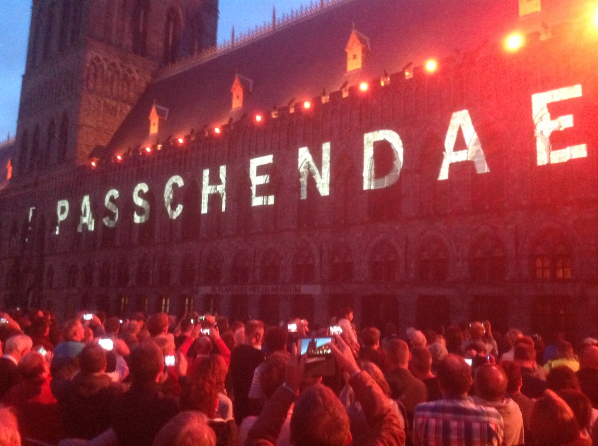 TerryWhenham's tweet image. Incredible memories from #Passchendaele Centenary in 2017. To see the Cloth Hall lit up with those images was a sight I will never forget. #Ypres #WW1