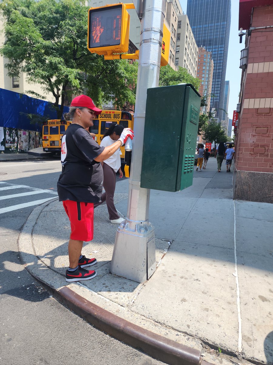 aceprogramsny's tweet photo. ACE Crew Member Jackie and Maritsa painted light poles (3 on every block) on the side of #9thAve, electric boxes, and fire hydrants with our amazing partner @ebottcher. Thank you for helping us keep the sidewalks and streets looking beautiful in #hellskitchen and #chelseanyc. https://t.co/ueNhXPTPUi