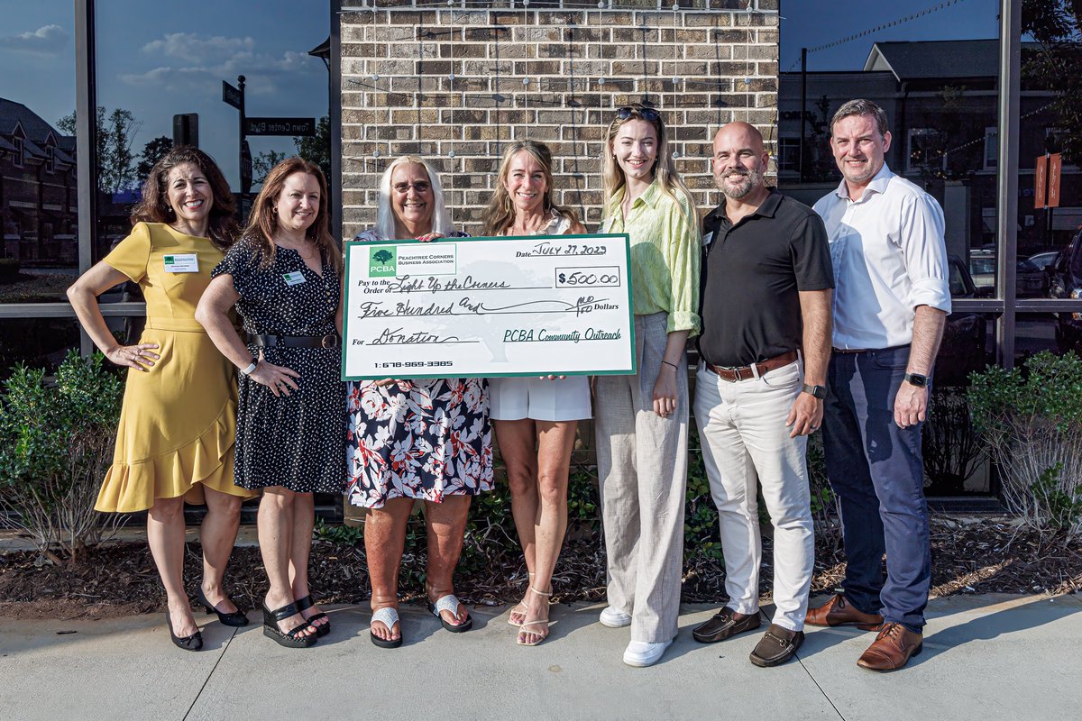 Peachtree Corners Business Association (PCBA) presented Light Up the Corners with a check for $500 as part of their Community Outreach Program! THANK YOU PCBA!
Stop by the PCBA booth at the 10th Annual Light Up the Corners Race on Saturday, August 12 and "get your glow on"!