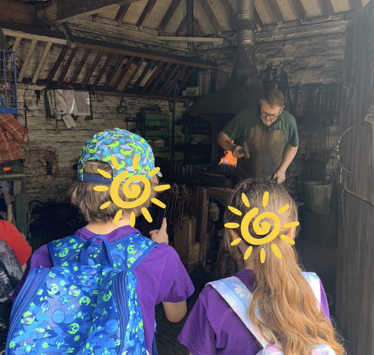 StJamesElstead's tweet photo. Learning about metalwork at the Rural Life Centre. The children watched a master blacksmith at work and asked lots of thoughtful questions. #HandsOnLearning #SchoolTrip #PrimaryEducation https://t.co/5L6nGhVLzn
