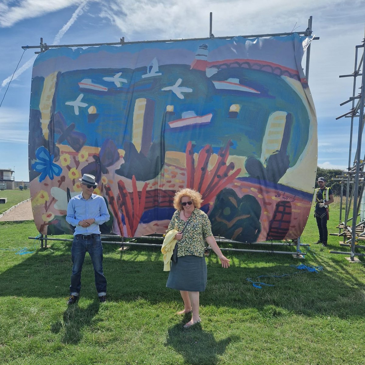 Artist Jo Lamb in Newhaven yesterday at the unfurling of her site-relevant landscape, part of the project Following Ravilious, an art trail of billboard-sized responses to our Eric's representations of the town, curated by Towner Eastbourne #ravilious