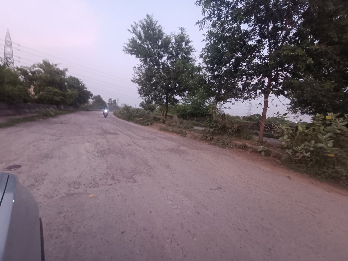 <a href="/noida_authority/">NOIDA Authority</a>  some pics of pushta bandh road which is in very poor condition, the road is  broken at every 100 MTR with big big pot holes , making it risky to drive esp during rains.. this road is a great asset and can reduce traffic at main roads . <a href="/CeoNoida/">CEO, NOIDA Authority</a> pls help