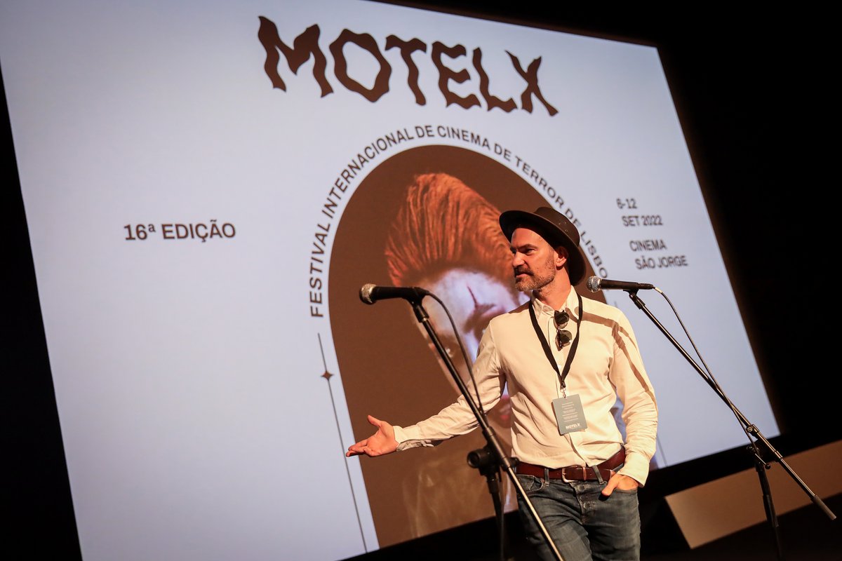 kommunioun's tweet photo. Jacques Molitor, the director, presents #KOMMUNIOUN aka #WOLFKIN at #moltex2022 in Lisbon, Portugal. https://t.co/C4GsEguNwo