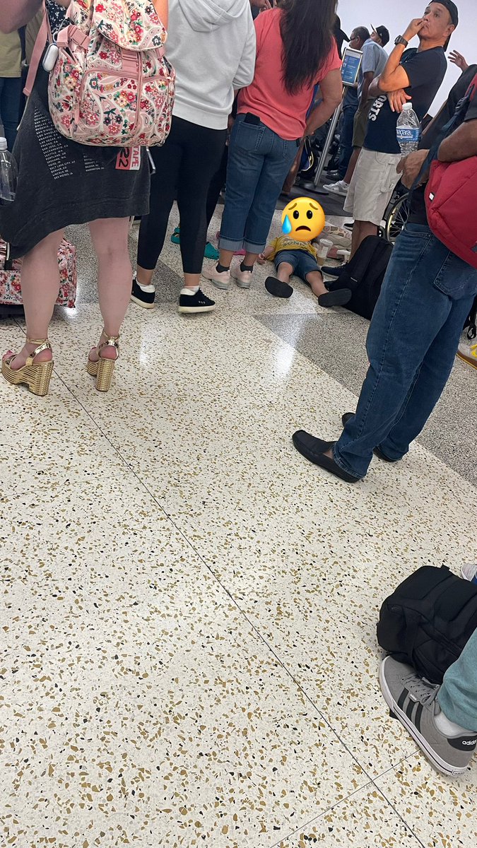 LoveMe4L's tweet photo. @SpiritAirlines is this acceptable after a 4 hour delay kids sleeping on the floor? https://t.co/feGAHQm20g