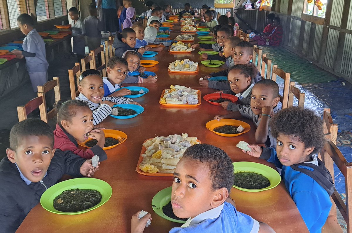 Years 1 students of Nailuva District School in the highlands of Ra having their lunch in the school dining hall.