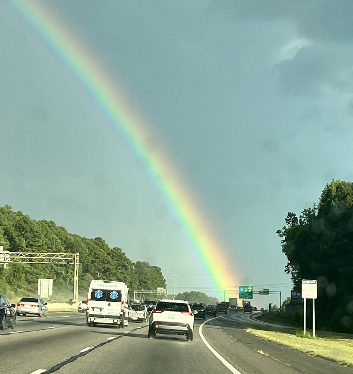 This is literally the most enormous, vibrant rainbow I’ve seen in my life. In #Raleigh today. Whoa…. Don’t judge the safety of this photo taking. Snapped while traffic stopped and had just restarted. People were turning on flashers to take pics.