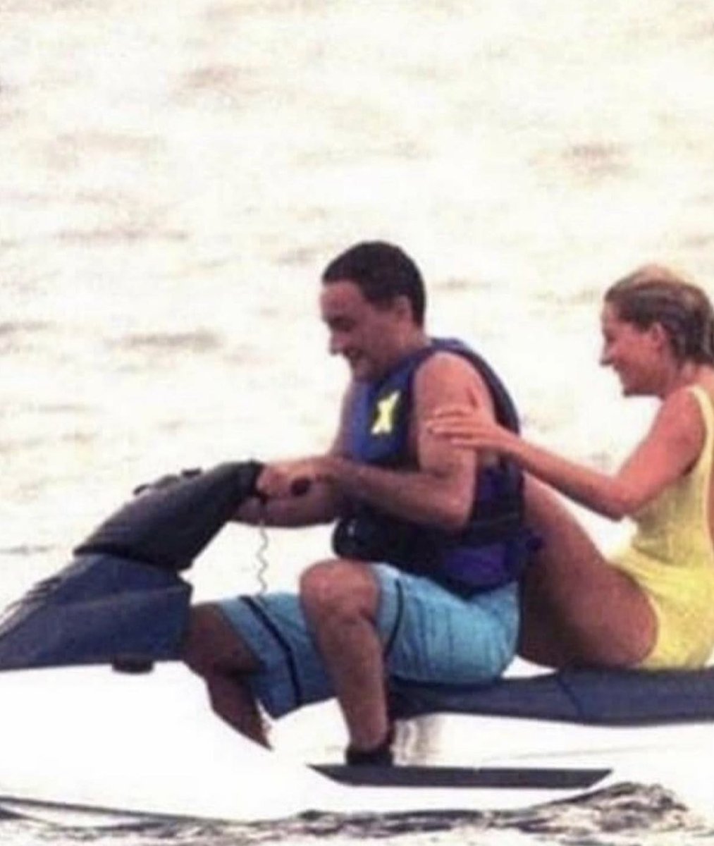Princess Diana and Dodi Fayed kiss, 1997. Diana, glowing, perches on the back of a jet-ski bobbing on a sun-kissed ocean as her new lover Dodi grips the handlebars. She appears laughing and carefree and - at 36 - on the brink of a new life after many troubled years.

It is still