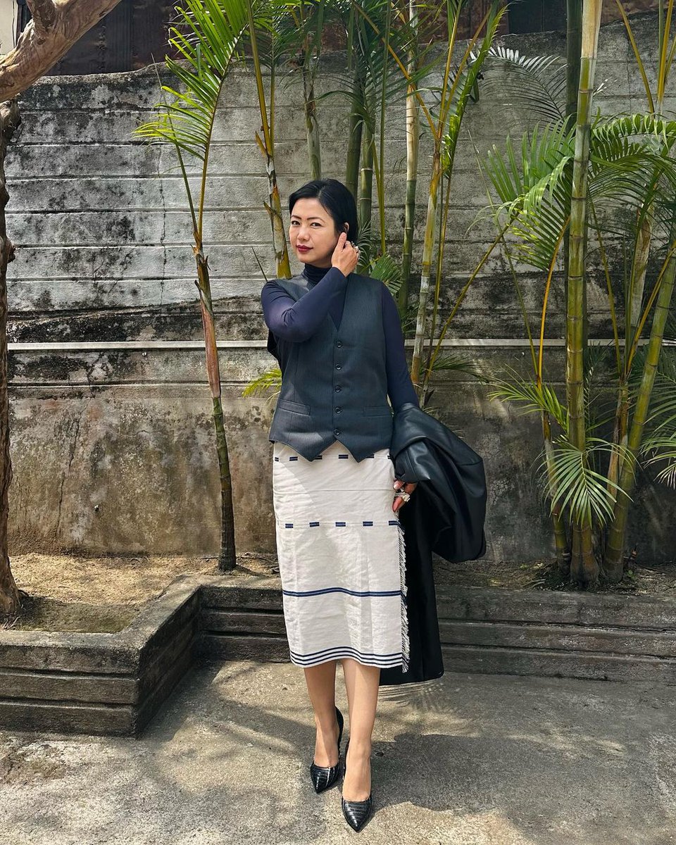 AlongImna's tweet photo. This Post is specially for ladies.

Lemme introduce @MekhalaMama, who is revolutionizing traditional fashion through her innovative styling of the mekhala. Her vibrant, eclectic outfits showcase the mekhala's versatility, combining it with stiletto boots, leather jackets, and even quirky tights!

Inspiring others to embrace sustainability, @MekhalaMama advocates for the value of indigenous textiles, reminding us of their rich heritage and the skill of their creators. 

Join her mission and support local artisans and designers. Together, let's create lasting demand for these timeless fabrics and empower our weavers! 🧶🙌