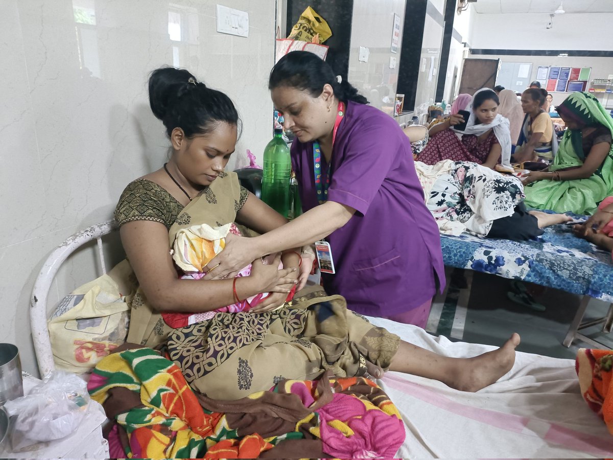 MayaSarad's tweet photo. Helping mother to breastfeed her baby. , https://t.co/bfRXbndDxN