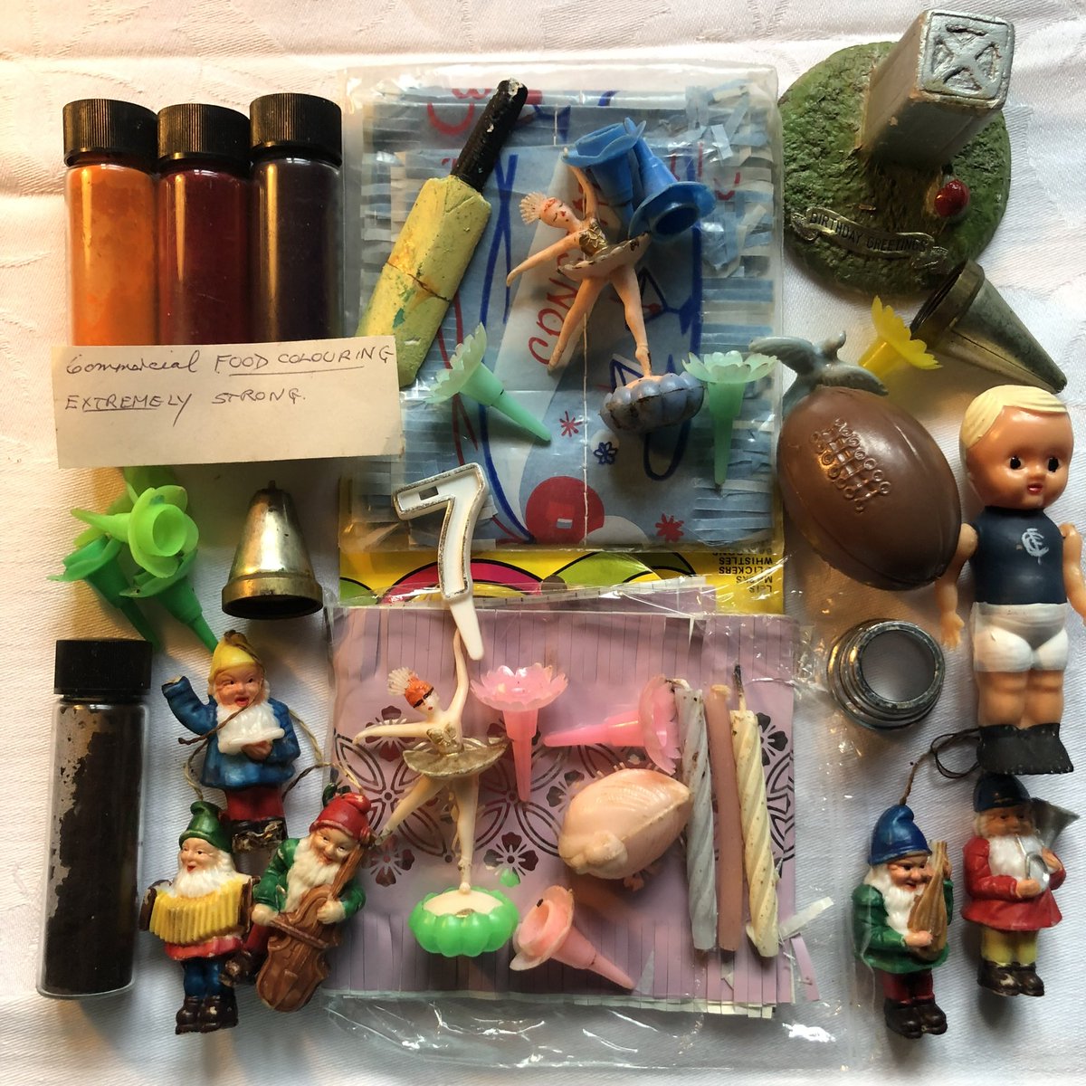 Anyone recognise any of these gorgeous goodies from cakes in the 1960s and 70s? 🎂 

Some ‘extremely strong' food colouring, candles and cuties!

These items in their original ice cream container were saved from a rubbish skip. Clearly much used and much loved