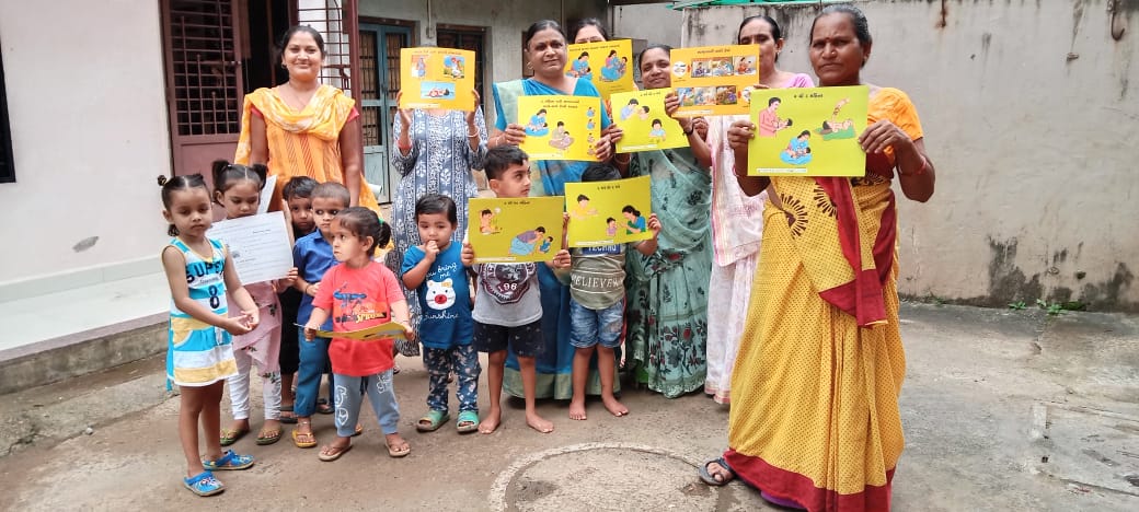 Breastfeeding first day celebration in Aaganvadi center with  Adolescent girl,pregnant and lecteting women and her family member.Give the information benefits of Take Home Ration. ICDS Dediyapada-2.Narmada