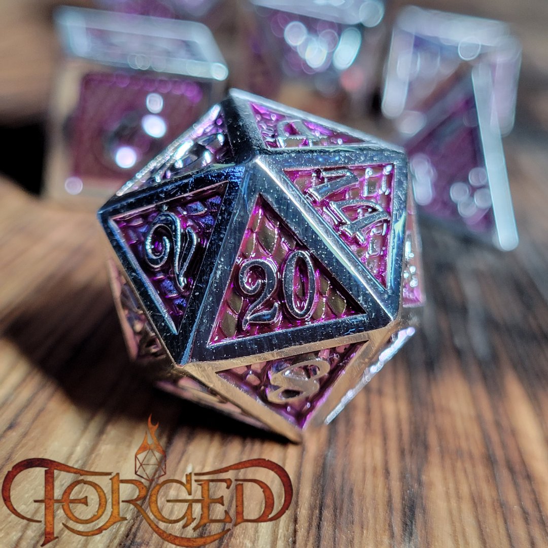 ForgedGamingCo's tweet photo. These pink hued dragon scale dice are giving fae realm

#Fae #dice #metaldice #dnd #pathfinder #forgedgaming https://t.co/eTlMQ52mSd