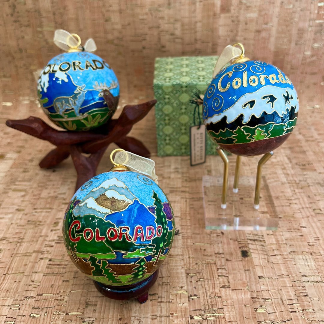 Happy Colorado Day! 🏔️ Embracing the Colorado spirit, these elegant cloisonne ornaments are a perfect way to capture the beauty of the Centennial State in every season! 🌲 #ColoradoLove #MountainLiving #ColoradoMountains