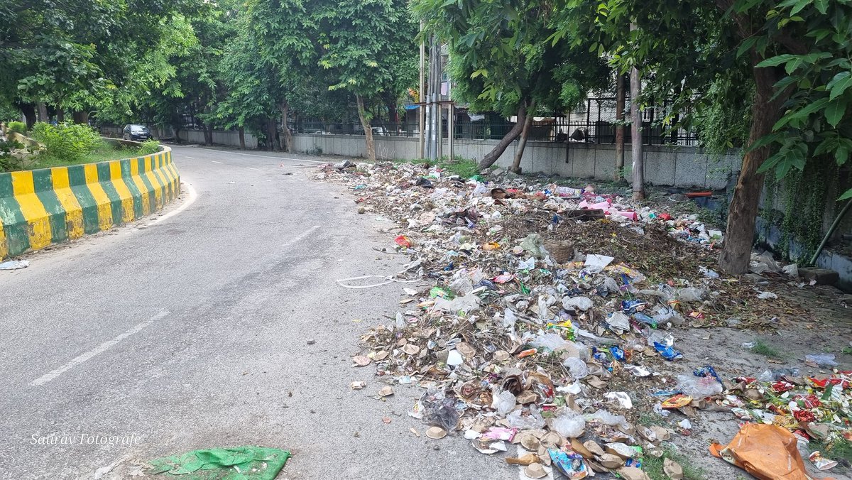 SawravD's tweet photo. @noida_authority @CeoNoida please see this.. outside Udyog Vihar Sector 82 Noida..looks like the a dumping ground.. need your help in clearing this up..this is on the road between Vivek  &amp; Udyog vihar https://t.co/6HM09jUTtF