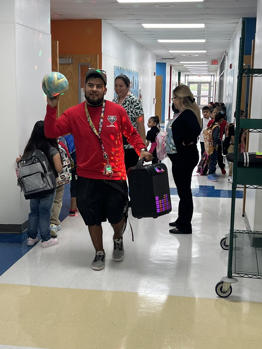 Coach Flores setting up the mood with music! Go day #2! #WeBeforeMe #TISDProud