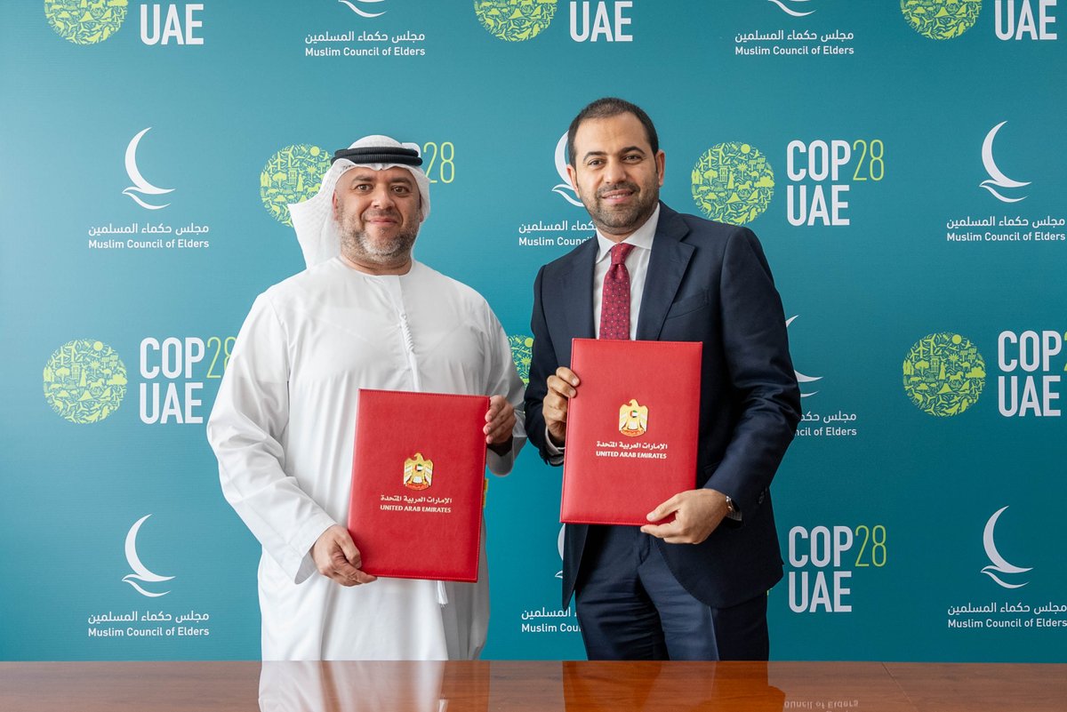 COP28_UAE's tweet photo. #COP28 DG Majid Al Suwaidi and HE Judge Mohamed Abdel-Salam, @MuslimElders Secretary-General, signed an MoU with the goal of establishing a partnership to promote interfaith dialogue, engagement, and climate action within the framework of COP28 UAE. https://t.co/leKKrfiqg9