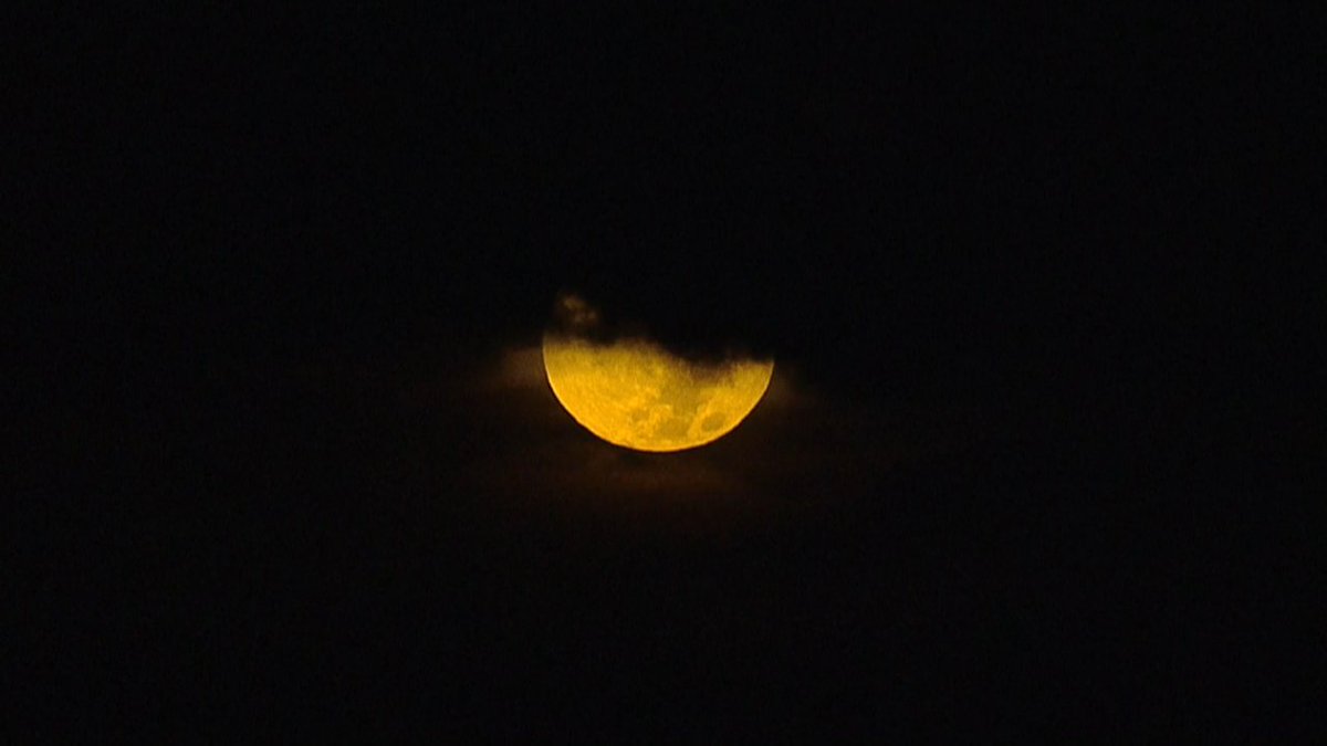 Beautiful shot of the Sturgeon Moon peeking behind the clouds courtesy of Action Air One! #GMTB #TampaBayTraffic
