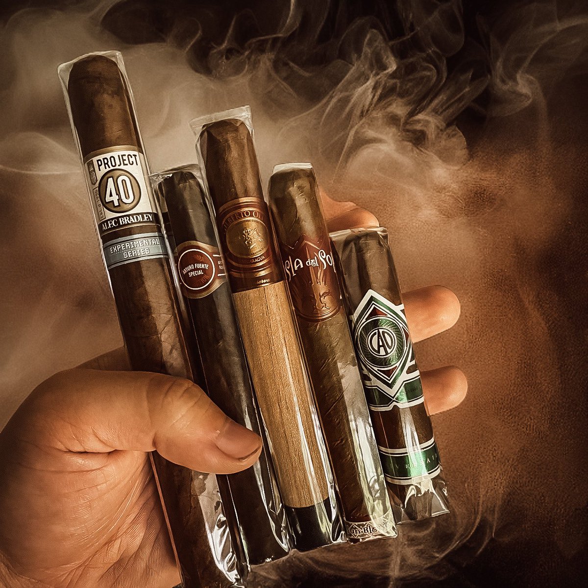 cigarshackuk's tweet photo. Another little delivery today 🚚

Here we have:
- Alec Bradley Project 40 Churchill
- Arturo Fuente Brevas Royal Maduro
- Oliva Gilberto Reserva Corona
- Drew Estate Isla Del Sol Sun Grown Gran Corona
- CAO Cameroon Perfecto
#cigar #cigars #cigaraficionado #cigarlife #botl https://t.co/EioQhz4x9N