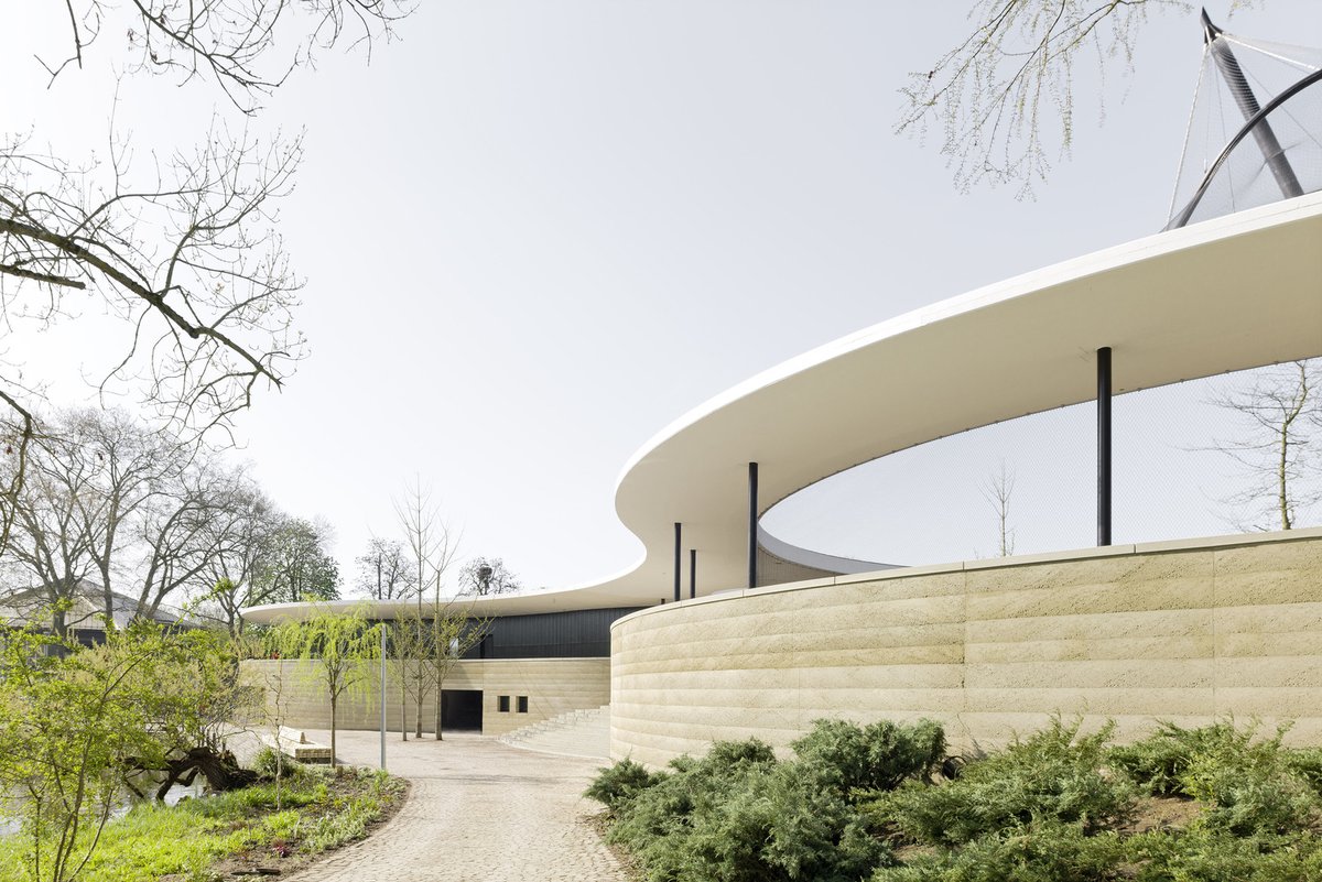 GADFOUNDATION's tweet photo. Green Experience Center in Luisenpark by Bez+kock Architekten boasts a unique design where the buildings blend seamlessly into the landscape. https://t.co/T36OqXbwlx