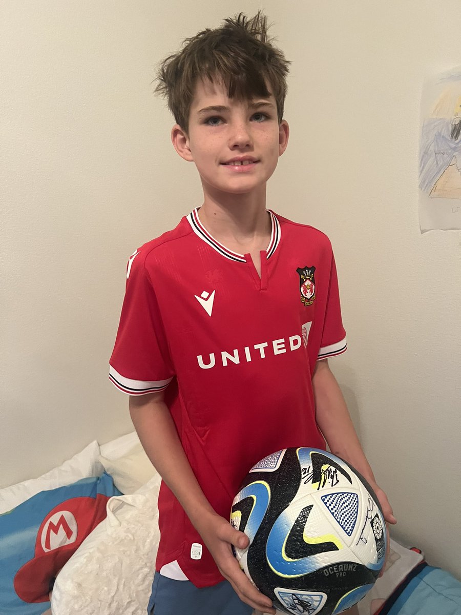 WrexhamAFCTampa's tweet photo. After a full day of traveling and two flights across the country (note the hair), at midnight this lad returned home to find a certain red shirt was waiting for him!!
Bring on MK Dons!! #LetsGoYouReds #wrexham https://t.co/Iph6bxsbtX
