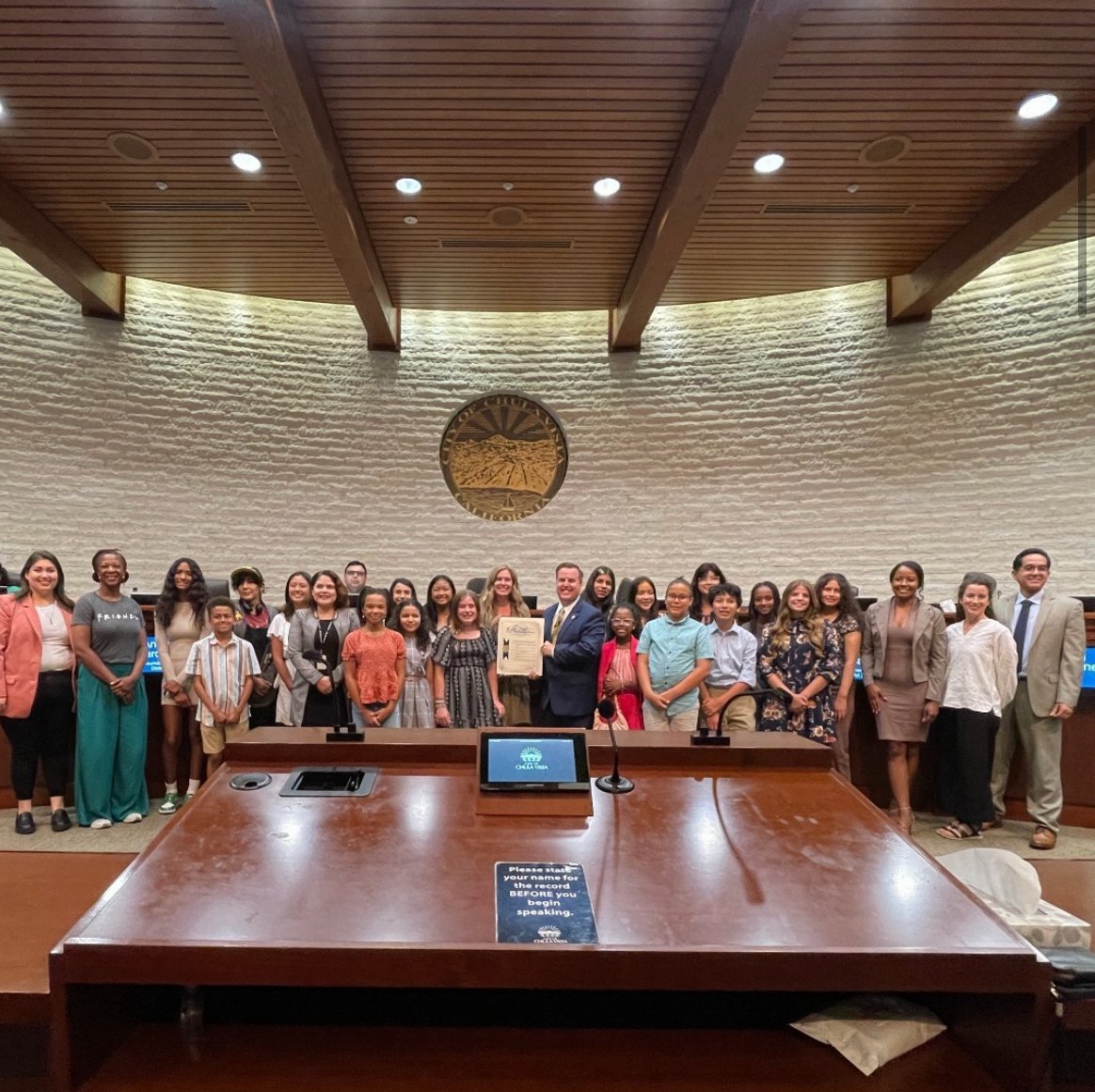 DCS_NEWS_CVESD's tweet photo. The city of Chula Vista presented a Proclamation to the Odyssey of the Mind Competition State Champions and World Finalists: 5th\6th Grade Gold Dragons, 8th Grade Green Dragons, and6th Grade Purple Dragons and Commending Discovery Charter School Coaches! We are so proud of you! https://t.co/gLmqun1jab