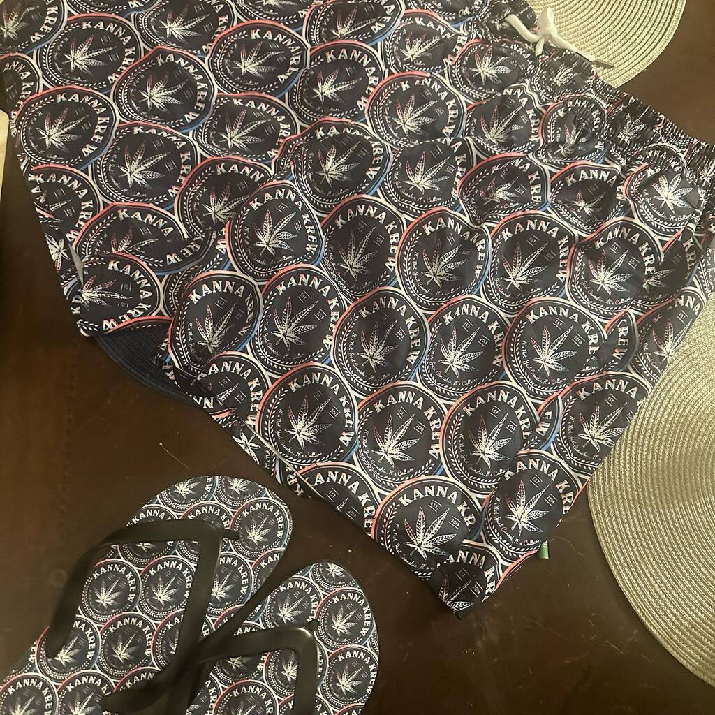 trappalations's tweet photo. Red, White &amp; Krew Swim Trunks and Sandals Design! 💦

From the second we finished the design we knew we had something dope. These pieces highlight the signature Circle Logo from the @kannakrew and define what it means to be a #flystoner 

Match this up with a Red, White &amp; Kre… https://t.co/iHrSuFyURb
