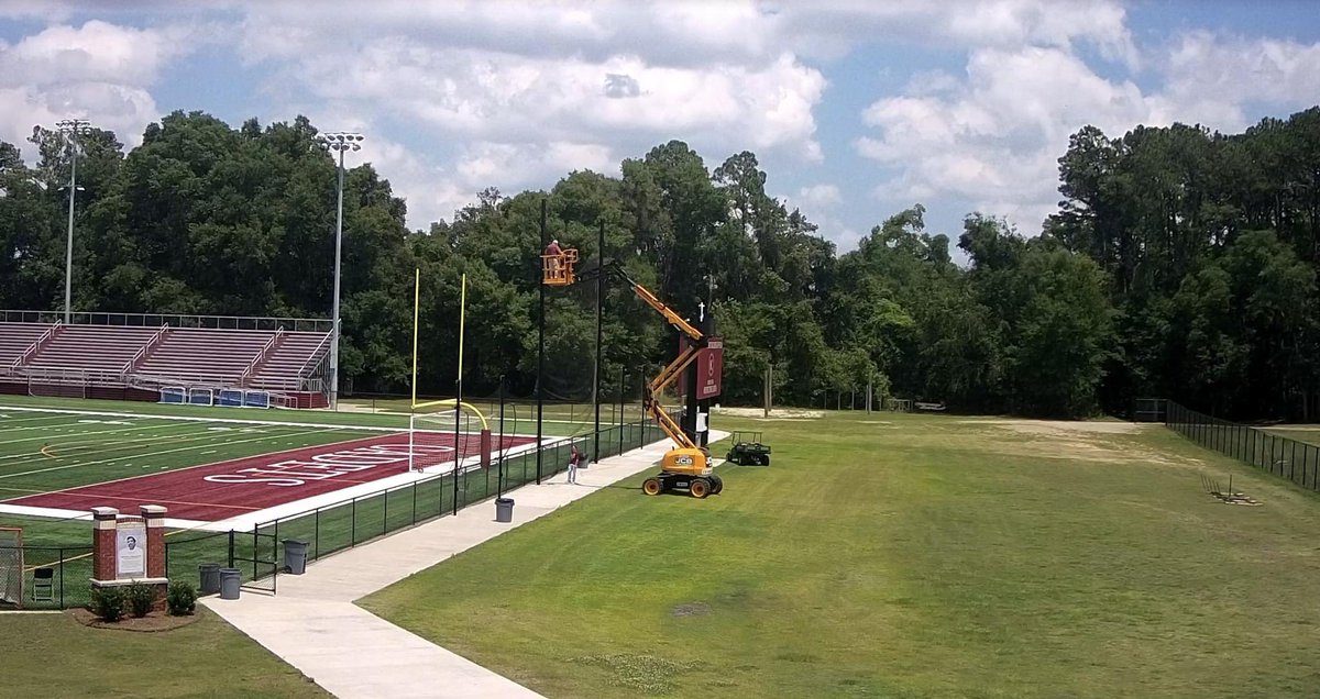 TheBC400's tweet image. #thebc400 thanks Mr. Trent McCurry of United Rentals for allowing us to use his lift this morning so that we can repair netting at Fr. Albert Field. That brave soul high in the sky is BC's Mr. Carey Harriott, Benedictine Military School Class of 1976. #ForwardAlwaysForward
