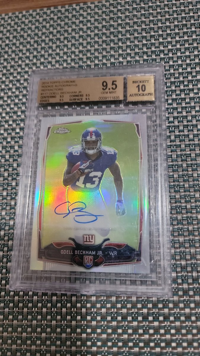 NewYawkGiant's tweet photo. 2014 Topps Chrome Odell Beckham Jr AUTOGRAPHED Refractor Rookie card # 004/150 & Graded 9.5(aka 10) by Beckett with 10 on signature! 🔥🔥
#OdellBeckhamJr #ComebackSeason #AnotherRing #BaltimoreRavens #collectible @obj LFG! 💰💰💰 https://t.co/y1oP3D4Kkc