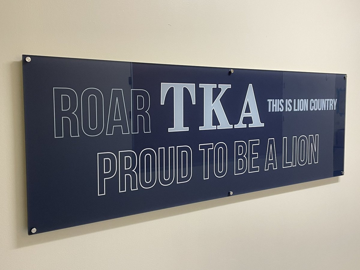 TKAPres's tweet photo. Many thanks to Mrs. Apryl Scalici for her summer refresh of the #TKAelementary hallways, prominently featuring the Truth of God’s Word! Let’s go, Lions! https://t.co/eFgAbLzZsE