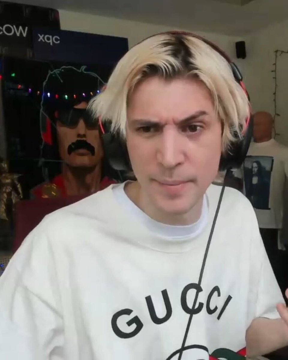 Dexerto's tweet photo. xQc facing criticism after YouTuber @NeoExplains showcased the streamer taking a 10 minute break while ‘reacting’ to his video https://t.co/6ahwCXDzWn