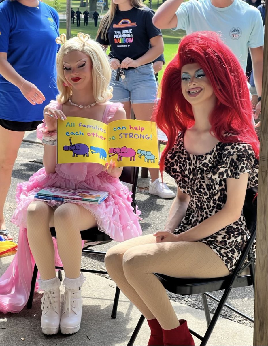 scarlett4kids's tweet photo. Hard to believe it…Christian kids are arrested for reading the Bible aloud outside of a drag queen event where biological males-dressed as if their next stop was a Rocky Horror Picture Show-read books about sexuality &amp; transgenderism to kids…then proceeded to dance for them. https://t.co/Ia1KAgRnsx