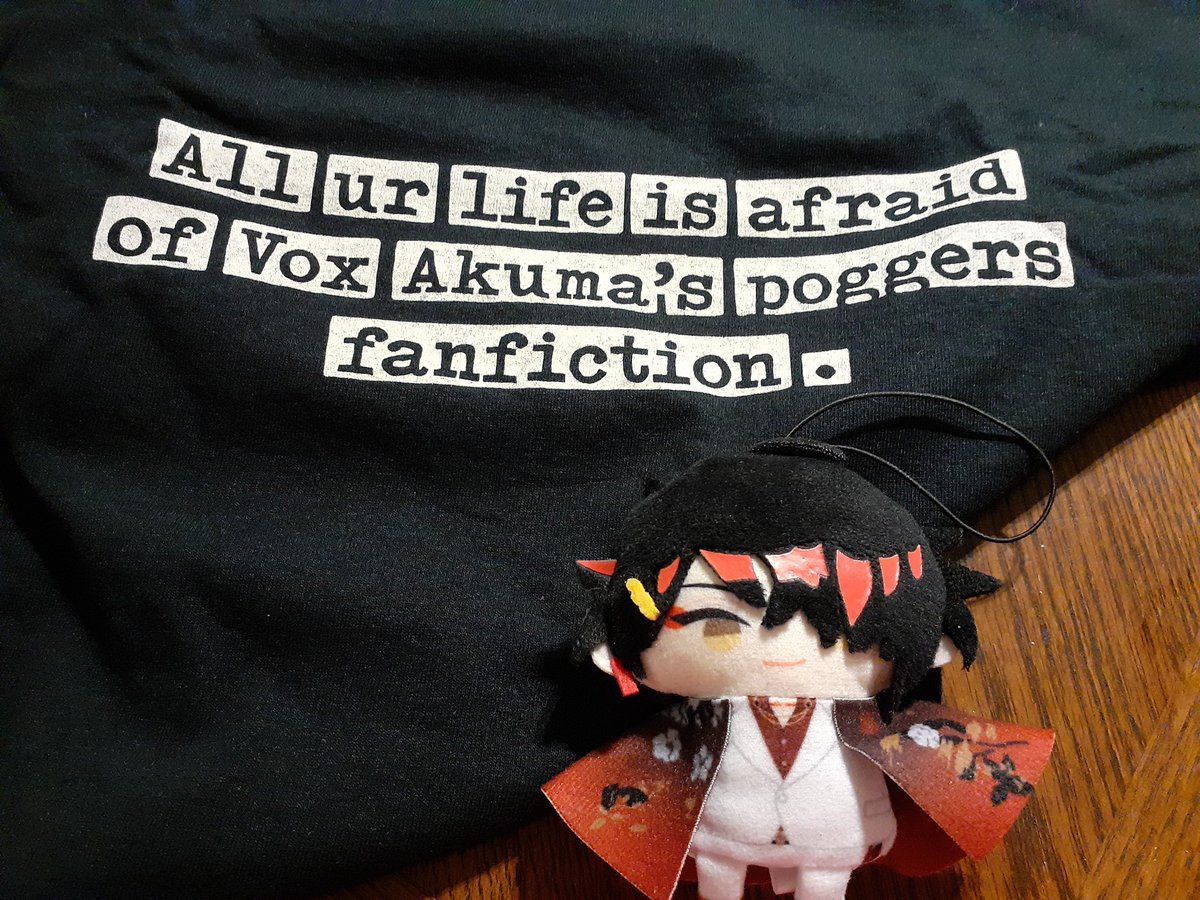 AngelicRoni's tweet photo. The shirt from another Simporiem Studios Jackbox game night just arrived in the mail. MiPuppet is judging me... #Jackbox #JobJob #NijiPuppet #AkumaMatata https://t.co/PcsuN0lBkW